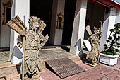 Bangkok Wat Pho, chinese style door guardians of the gallery of the eastern courtyard of the temple compund. 